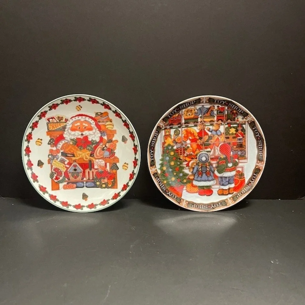 Lillian Vernon Christmas Plates Set 2 Santa Toy Shop Cross Stitch Style 7.5 in